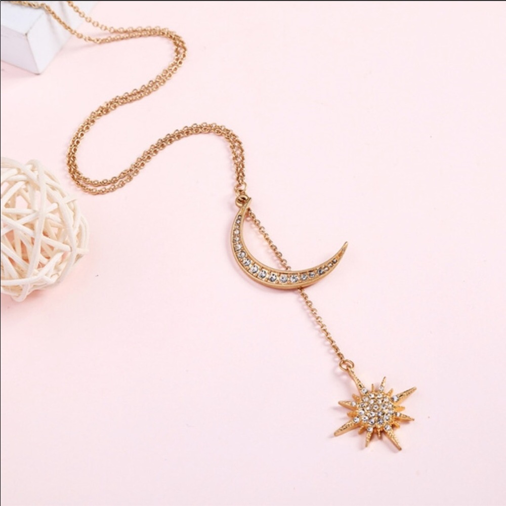 Moon and star necklace.